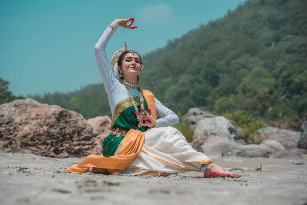 Woman performing a traditional dance of east india.